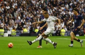 Mbappe double helps Real keep pressure on leaders Barca