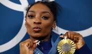 Simone Biles clinching all-around gold at Olympics