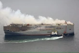 Burning cargo ship carrying 3 000 vehicles abandoned off Alaska