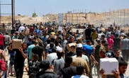 Aid trucks move from Egypt to Gaza after Israel began airdrops
