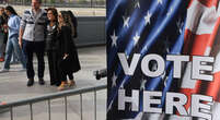 Voters turn out at the polls in swing state Michigan