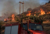 Greek island wildfire displaces over 1 000