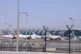 Dubai airport suspends operations after drone sparked fuel tank fire