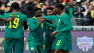 Defiant Senegal display Afcon trophy before beating Peru in friendly