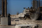 Tanks thrust deeper into Gaza, medics say many injured are trapped