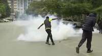 Kenyan police fire teargas on small groups of protesters in Nairobi