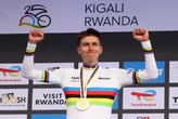Flamboyant Pogacar retains world title to cement legacy