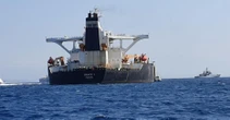 Oil slides below $100