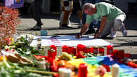 German city’s festival succumbs to grief after fatal stabbings