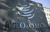 WTO plans 10% budget cut as US falls back into arrears, documents show