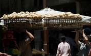 Egyptians struggle with first bread subsidy cut in decades