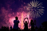 New York state skylines glow with fireworks as COVID-19 restrictions lifted