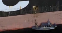 Iran shows off its control over strait, Israel warns of further attacks