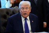 Trump refuses to apologise for racist video of Obamas