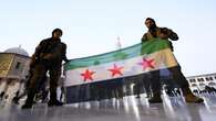 Syria’s rebels work to form government, restore order