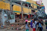 Indonesians rush uphill after 6.1 magnitude quake near Moluccas