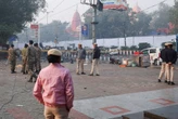 Forensics and police survey scene after blast near Delhi’s Red Fort