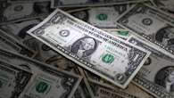 Dollar eases as data leaves rate cut hopes intact