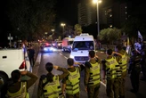 Hamas hands over hostage bodies after Israel threatens aid cut