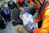 Indonesia earthquake slows rescue of students in building collapse