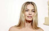 Delusa dagli Oscar Margot Robbie si consola al Monopoly