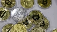 Crollano le criptovalute, Bitcoin sotto 100.000 dollari