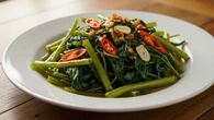 Resep Tumis Kangkung Terasi yang Wangi, Renyah, dan Tetap Hijau
