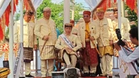 Makna Prosesi Injak Kepala Kerbau saat Jokowi Terima Gelar Adat Lampung