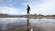 Menikmati Keindahan Pantai Karang Hawu, Permata Tersembunyi di Sukabumi