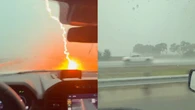 Raio atinge carro em estrada durante temporal; veja