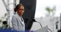 Michelle Obama's speech at center opening moves husband to tears
