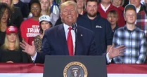 Trump defiantly mocks impeachment vote at Michigan rally