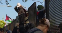 Police arrested 13 people during first day of DNC; security fence fortified
