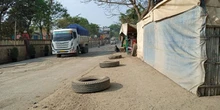 Lubang dan Debu, Warga Keluhkan Aktivitas Truk Tanah di Jalan Raya Perancis Tangerang