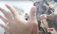 Moment armed Taliban militants charge at CNN reporter in middle of live TV report - VIDEO