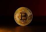 Cryptomonnaies : le bitcoin dépasse la barre des 60.000 dollars et s'approche de son record historique