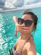 Lâm Tâm Như khoe loạt ảnh bikini gợi cảm sau sự cố lộ mặt sưng phồng méo mó