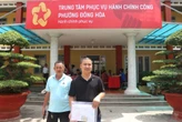 Hình ảnh người dân đi làm thủ tục hành chính ở các phường, xã mới tại Bình Dương