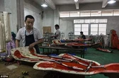 Bên trong nhà máy sản xuất búp bê người lớn AI