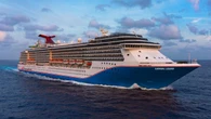 Cruise passengers witness terrifying rescue at sea as stranded man and cat pulled from failing sailboat