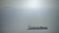 Cargo ship attacked by small craft near Strait of Hormuz, UK maritime agency says