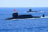 China launches rare submarine ballistic missile as Pacific allies strengthen defense ties before NATO summit