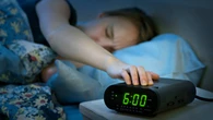 Most Americans hit the snooze button every morning — here’s why it could be bad for your health
