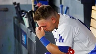 Dodgers catcher takes out frustration on himself by banging bat over his own head after strikeout