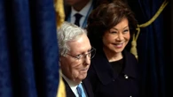 McConnell's wife, Elaine Chao, saw no need for 'immediate return' from China as former GOP leader hospitalized