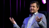 Chess grandmaster Magnus Carlsen slams fist on table after defeat