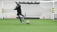 Robot soccer player dents wall with terrifying kicks