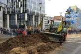 Farmers seal off streets, throw beets, spray manure at police in protest outside of European Union HQ