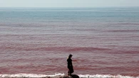 Wild viral video shows 'blood-red' scenes covering island after rainstorm