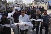 At least 82 killed in Israeli strikes on Gaza as critical aid fails to reach Palestinians